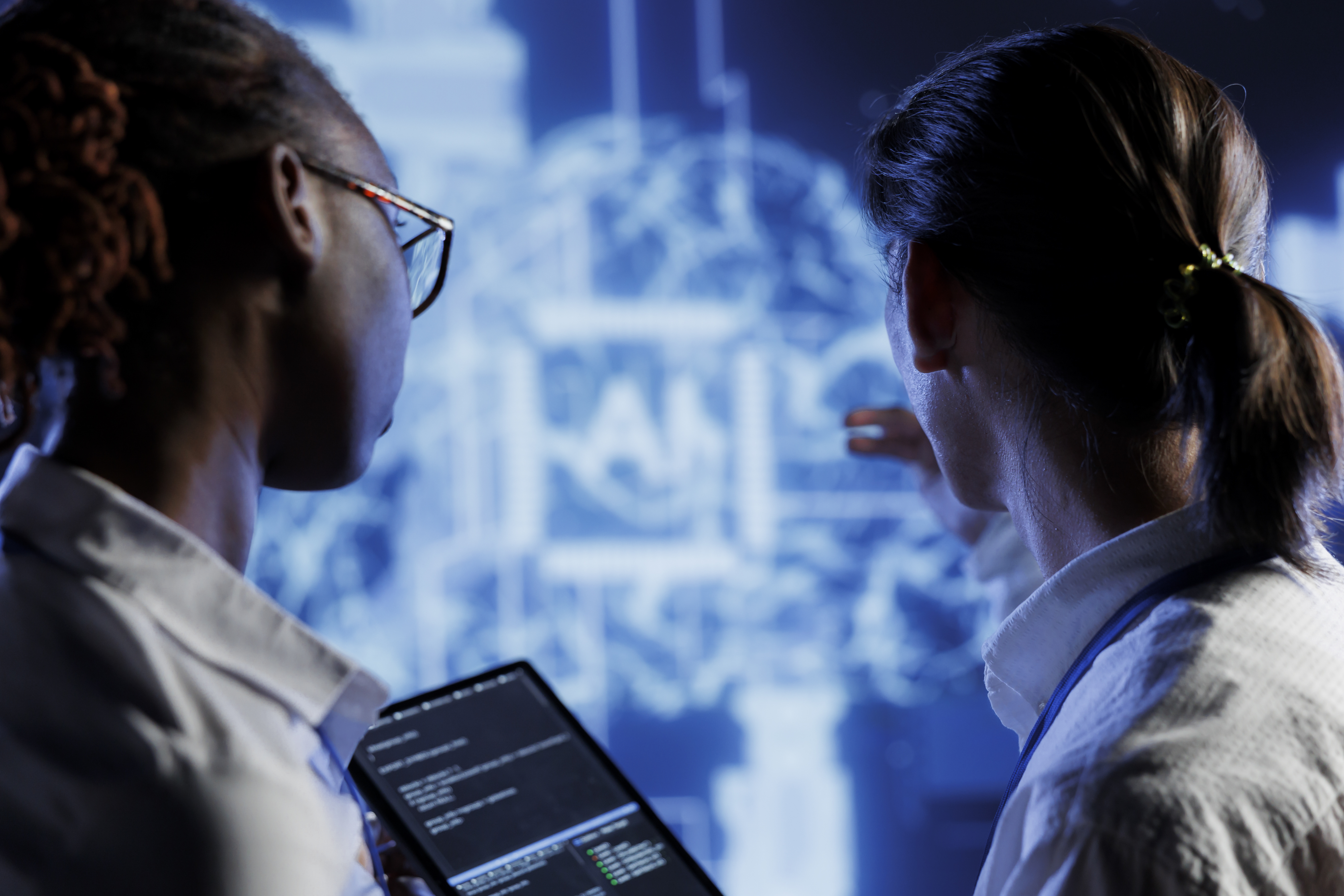 /media/it-consultants-brainstorm-ways-use-ai-cognitive-computing-extract-usable-information-from-complex-data-high-tech-facility-workers-implement-artificial-intelligence-process-inference-datasets-1.jpg